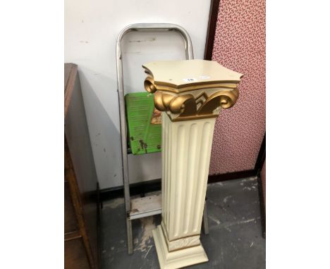 A DISPLAY PEDESTAL AND A STEP LADDER. 