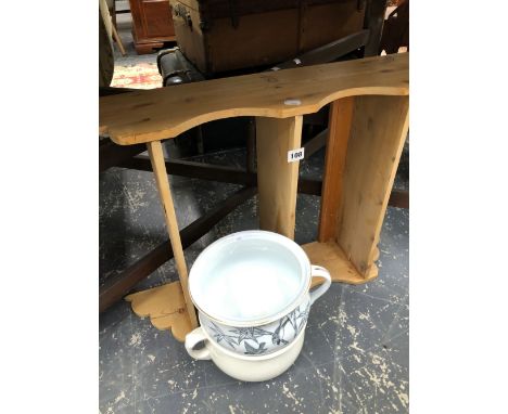 AN ANTIQUE PINE WALL SHELF AND TWO CHAMBER POTS. 