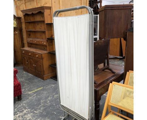 A VINTAGE MEDICAL FOLDING SCREEN. 