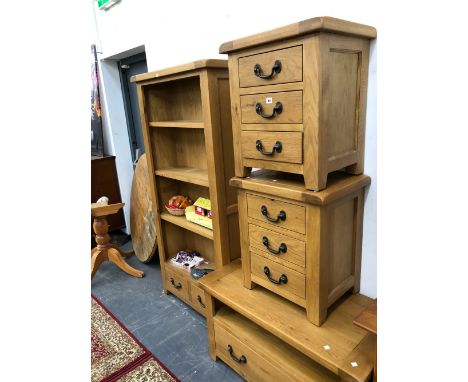 A GOOD QUALITY OAK OPEN BOOK CASE, A PAIR OF THREE DRAWER END TABLES, AND A TV TABLE. 