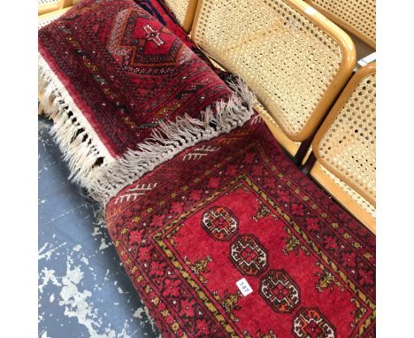 THREE VINTAGE EASTERN SMALL RUGS. 