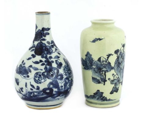 Two Chinese blue and white vases, comprising: one bottle vase, 18th century, the pear-shaped body painted with peony in a gar