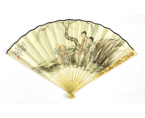 A Chinese fan, early 20th century, painted with ladies and boys in a garden, inscribed , the reverse with a long inscription 