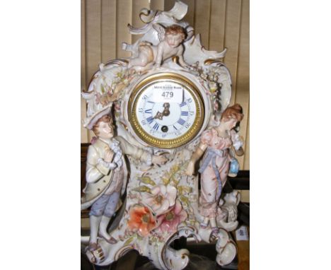 Decorative continental ceramic mantel clock with figural and floral decoration - 40cm high