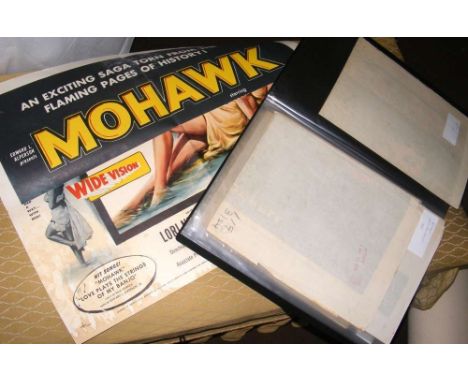 An album containing a selection of 1950's, etc., vintage film posters, including 1956 "Mohawk" etc.