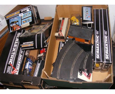 Two boxes of old Scalextric racing cars and accessories