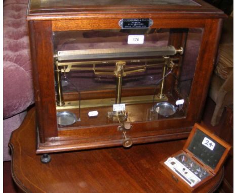 Goodbrand & Co. Ltd. cased laboratory scales, together with a set of cased antique weights
