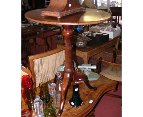 Antique circular mahogany wine table on tripod support