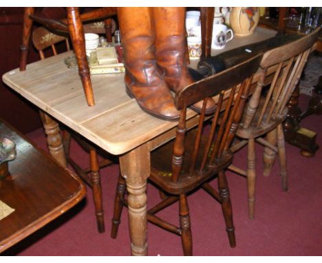 Victorian stripped pine kitchen table, together with four stick back chairs