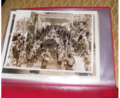 An album containing vintage film promotion photographs, including "Gone With The Wind" and other