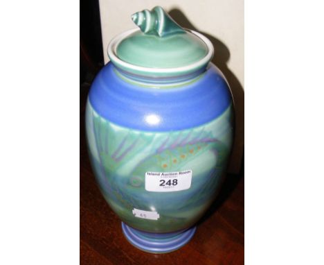A Poole Studio vase and cover with fish decoration - Artist's signature to base and original box - 26cm high