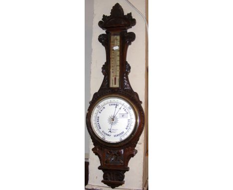 Carved wooden wall barometer/thermometer