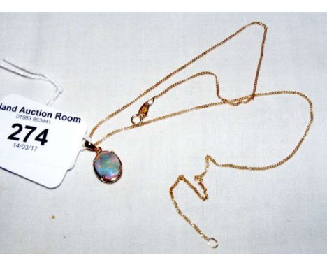 A 9ct gold opal pendant and chain