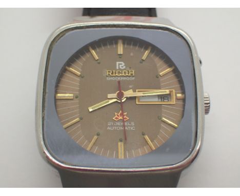 Ricoh 21 jewels automatic gents wristwatch  CONDITION REPORT: this item was working at lotting up, but day dial is stuck 
