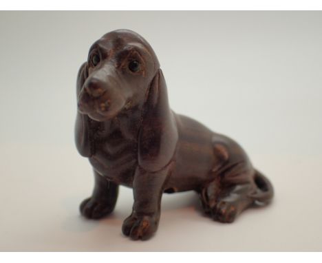 Signed wooden netsuke of a dog