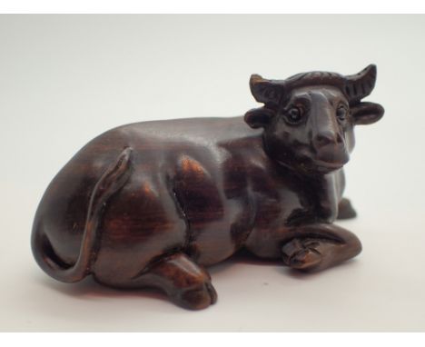 Signed wooden netsuke of a water buffalo