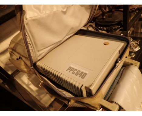 Vintage portable Amstrad PPC640 computer with backpack 