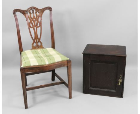 A small oak cupboard, 18th century, adapted, 45cm wide x 33cm deep x 50cm high and a 'Chippendale Revival' carved mahogany di