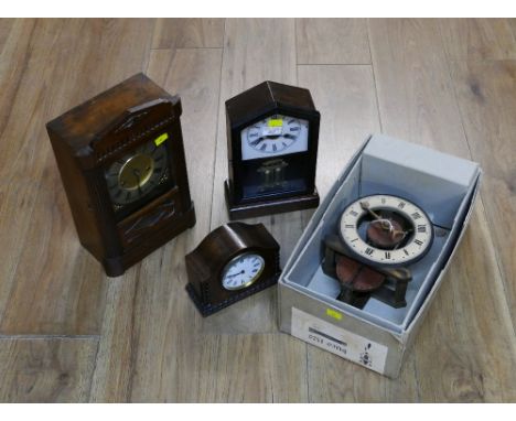 Wall clock and four mantel clocks
