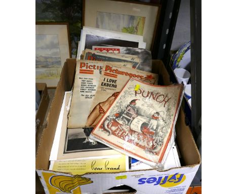 Box of advertising pictures in clip frames and quantity of vintage Picture Goer and Punch magazines