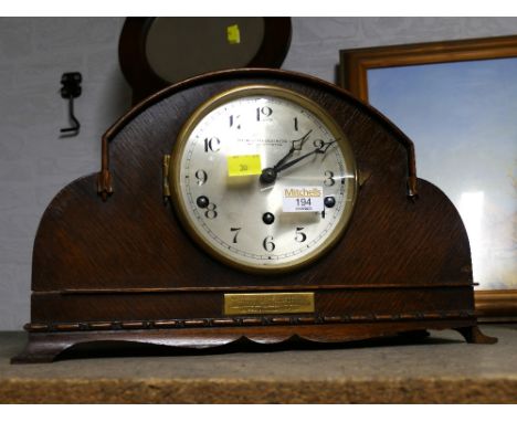 Wooden mantel clock by The Northern Goldsmiths Company, Presented to P.R. Kennedy From The officials of Howton Colliery on Th
