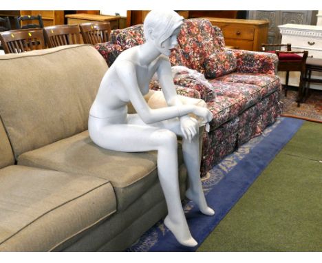 Seated female mannequin 