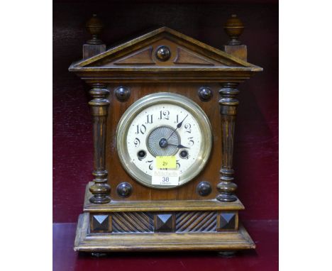 Wooden mantel clock with German movement, last restored, cleaned and serviced 1970, with key