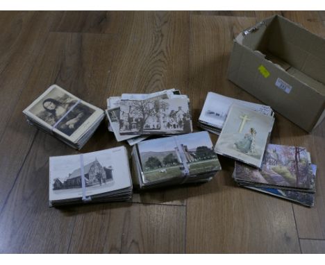 Box of vintage postcards