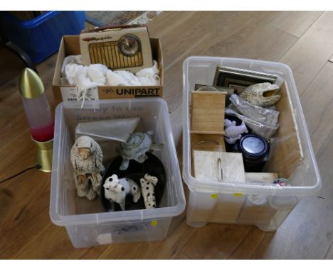 Two boxes of ornaments, transistor radio, storage boxes etc