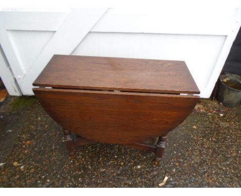 Oak gate leg table with turned legs  H73cm W90cm D40cm approx