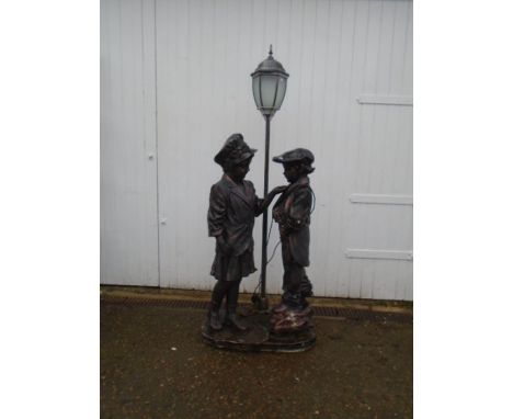 Bronzed effect resin garden lamp depicting boy and girl H172cm approx