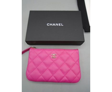 Chanel coin purse pink, quilted with dust bag, original box and certificate of authenticity . Purchased in 2016 in New Bond s