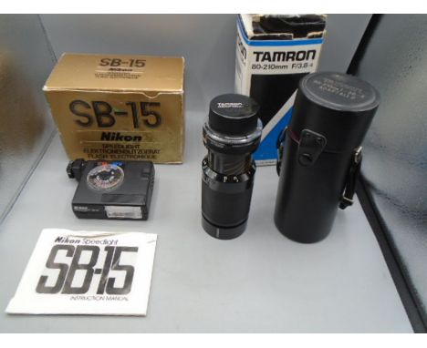 Nikon speedlight flash unit, in box with manual and a Tamron 80-210mm lens for Nikon, in case and box