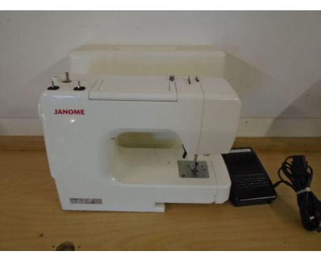 Janome sewing machine model j3-24 with manual and accessories