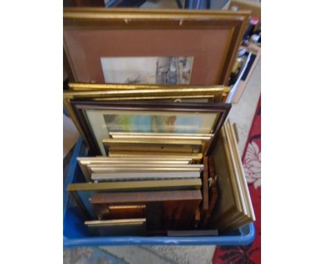 A box of photo frames and a few prints