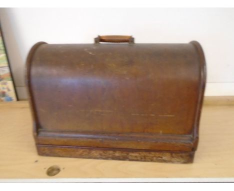Singer sewing machine in case with original manual