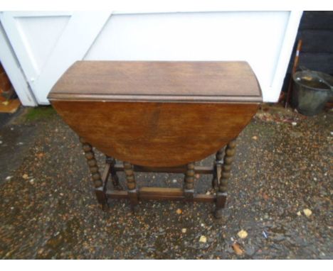 Oak gate leg table with bobbin turned legs H75cm W77cm D32cm approx