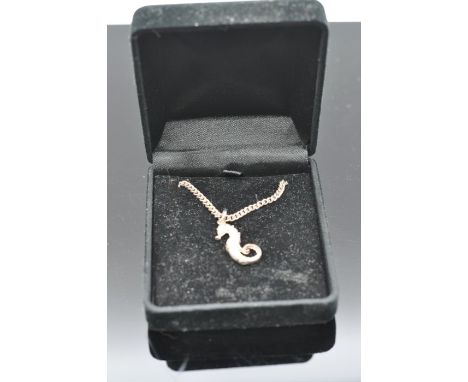 Sea-horse pendant necklace on silver chain 