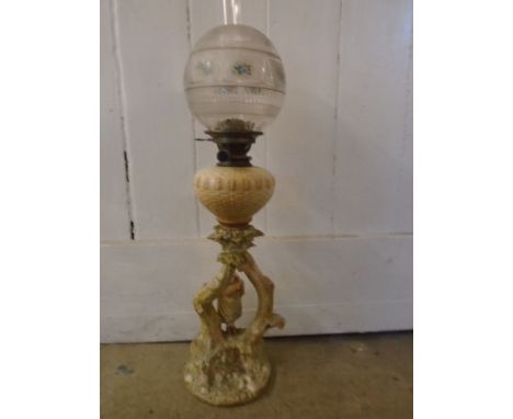 Hadley porcelain based decorative oil lamp 32" tall. signed at base. There is a a loss on the ladies hand near her skirt, see