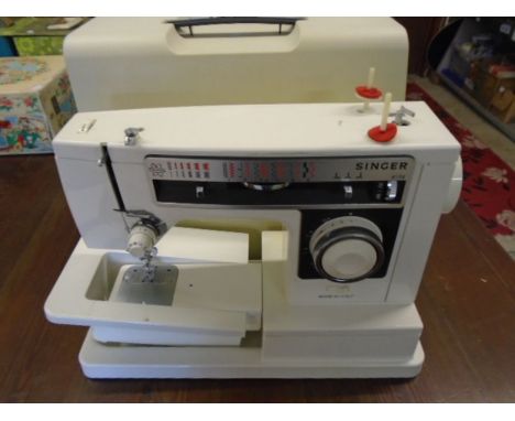 Singer 6136  electric sewing machine with manual and foot
