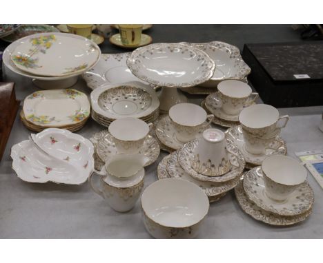 A VINTAGE 'PENDANT' TEASET, TO INCLUDE, A CAKE STAND, CAKE PLATE, BOWLS, A CREAM JUG, SUGAR BOWL, CUPS, SAUCERS AND SIDE PLAT