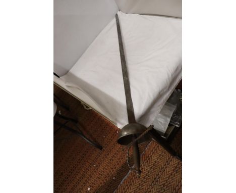 A VINTAGE SWORD WITH A BASKET HILT AND ENGRAVING TO THE TOP OF THE BLADE 