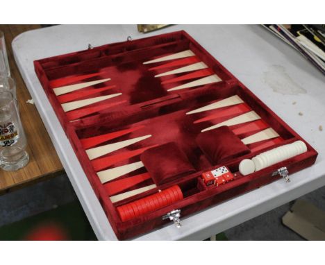 A CASED BACKGAMMON SET 