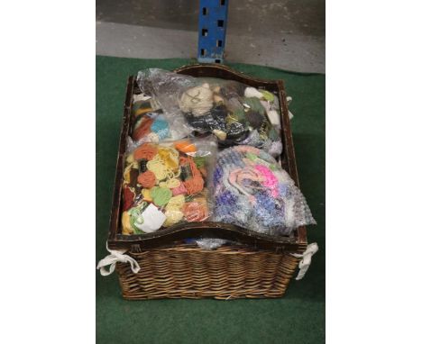 A LARGE BASKET OF TAPESTRY WOOL 