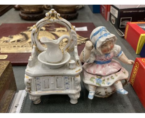 TWO ORIGINAL GERMAN TRINKET BOX FAIRINGS TO INCLUDE A DRESSING TABLE WITH WASH JUG AND BASIN AND GIRL IN A BONNET GOOD COLOUR