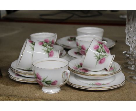 A COLCLOUGH ROSE PATTERNED PART CHINA TEASET, TO INCLUDE A CAKE PLATE, SUGAR BOWL, CUPS, SAUCERS AND SIDE PLATES 