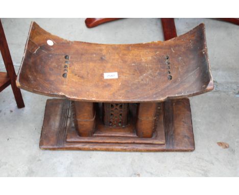 A VINTAGE AFRICAN TRIBAL STOOL 