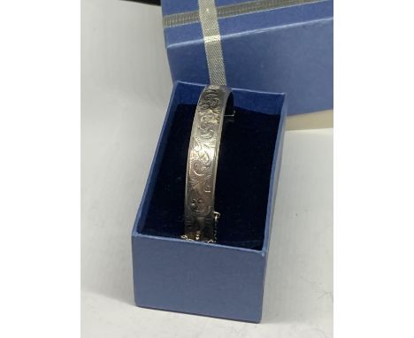 A SILVER BANGLE 