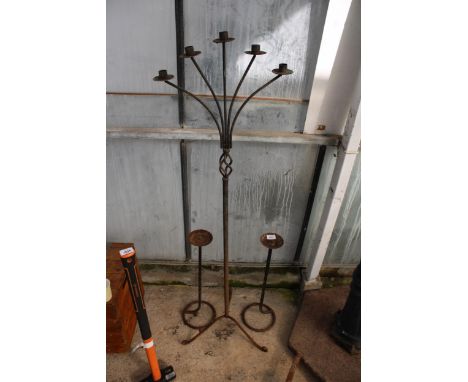 A PAIR OF METAL CANDLESTICKS AND A FURTHER 5 BRANCH METAL CANDLESTICK 