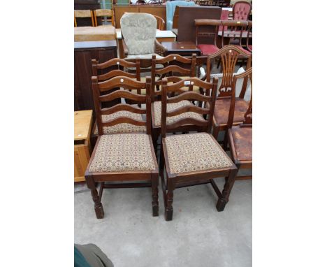 A SET OF FOUR OAK LADDER BACK DINING CHAIRS ON TURNED FRONT LEGS 